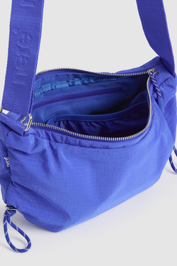 n.motion Crescent Sling Bag
